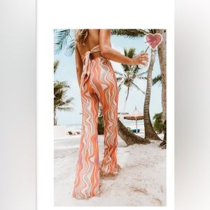 Show me your MuMu frolic flare pant size medium NWT sold out online wavy stripe